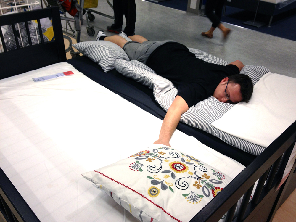 Glen lying on what will be our day bed/couch.