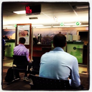 Waiting in Services Ontario. Whenever a number came up on the screen, the guy on the left kept turning to look who stood up. Maybe he thought he could jump ahead. He looked like he had places to be.