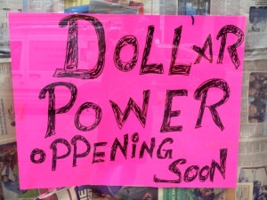 A wonderful sign in a store window that I saw while out getting groceries.