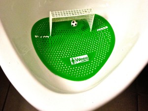 Inside the urinal at the Queen and Beaver. The soccer ball moves.