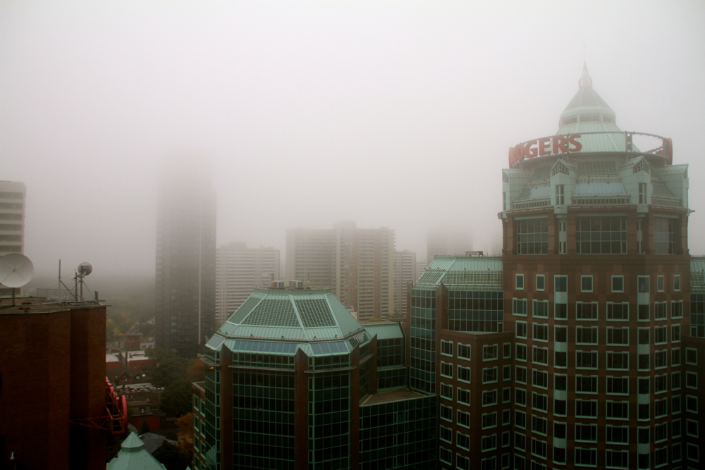 Buildings wrapped in clouds