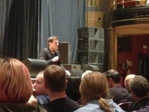 Blurry photo of Izzard during the Q&A.