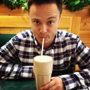 Glen with a giant milkshake at Anchor Cafe